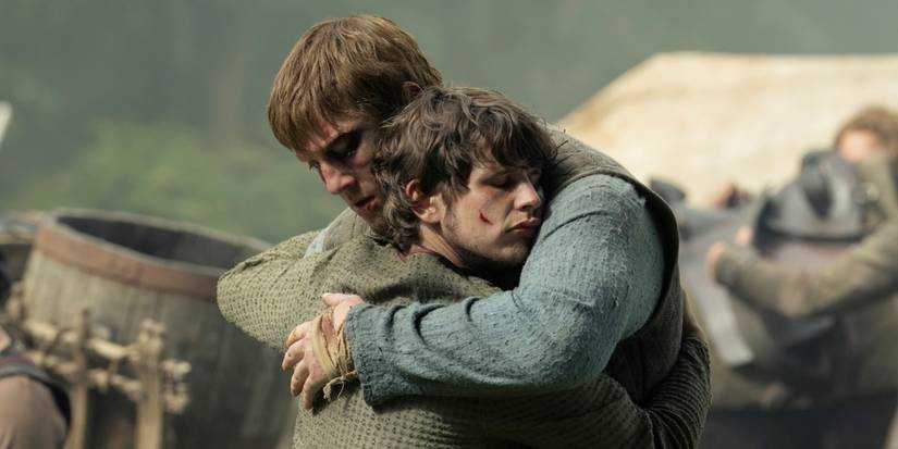 Peter Claffey as Dunk hugging Shaun Thomas as Raymun Fossoway in A Knight of the Seven Kingdoms