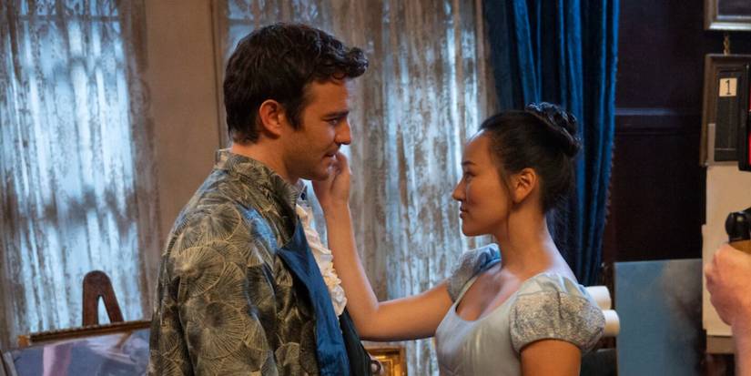 Benedict (Luke Thompson) and Sophie (Yerin Ha) in the library at My Cottage in 'Bridgerton' Season 4, Episode 3.