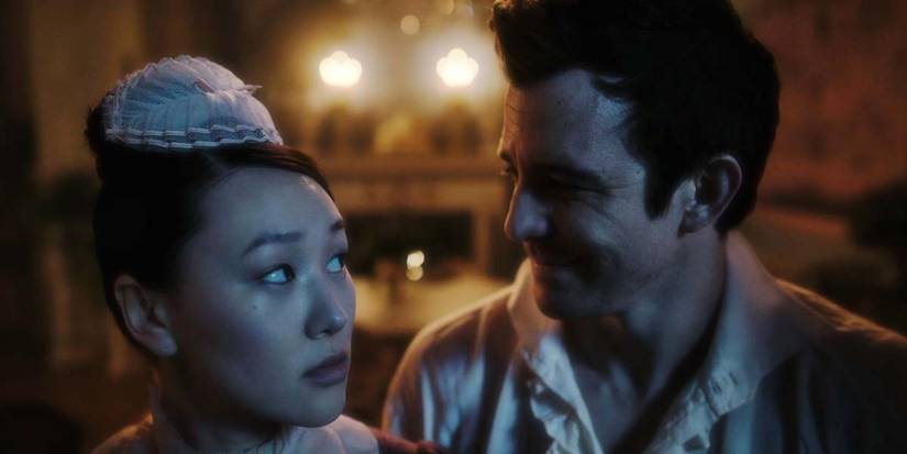 Sophie (Yerin Ha) and Benedict (Luke Thompson) looking at each other in 'Bridgerton' Season 4, Episode 4.