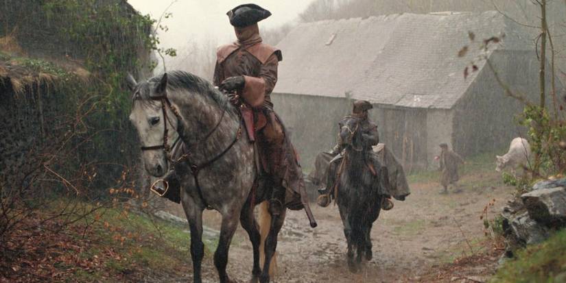 Two men on horseback in Brotherhood of the Wolf