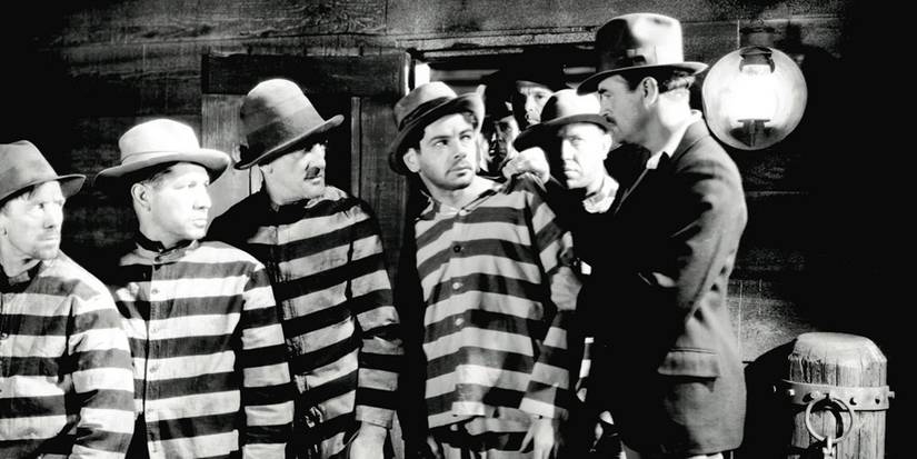 Cast of 'I Am a Fugitive from a Chain Gang' in prison clothes 