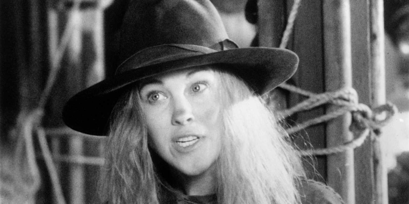 Catherine O'Hara as Calamity Jane holding two pistols in Tall Tale.