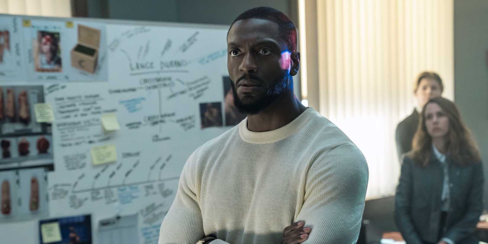 Aldis Hodge as Alex Cross in the police station working on the case in Cross Season 2