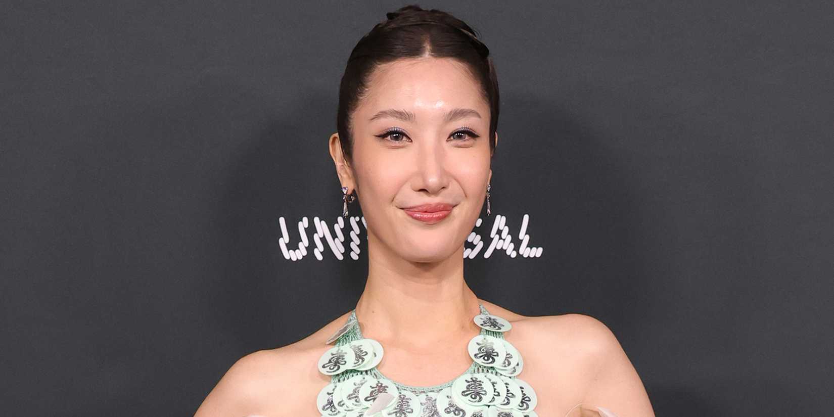 EJAE attends an event and walks the red carpet.