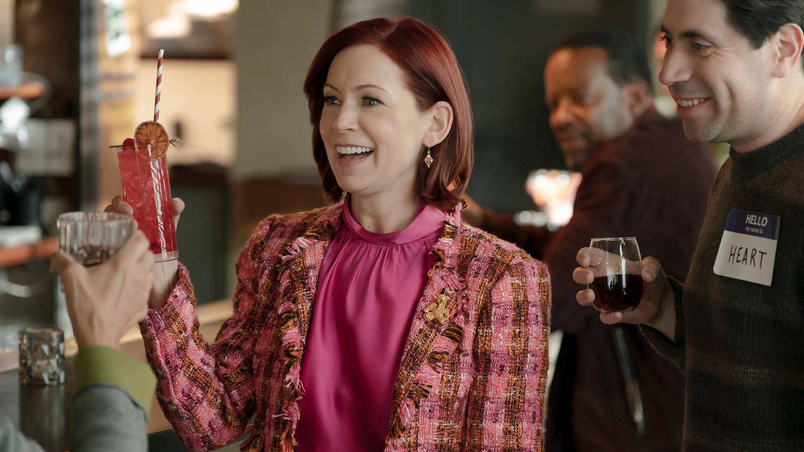 Elsbeth (Carrie Preston) and Cord (Danny Jolles) with drinks in the Elsbeth episode 