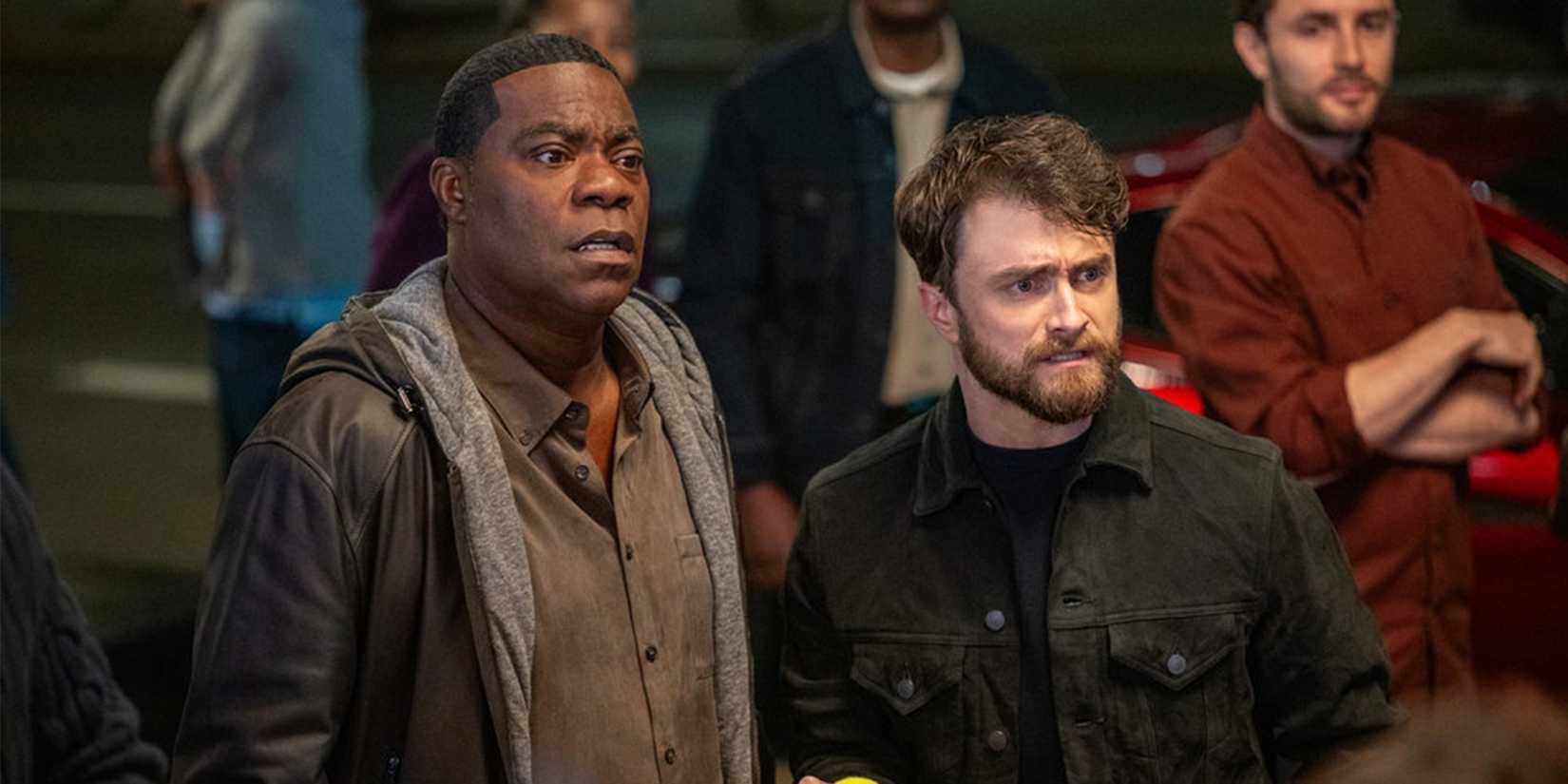 Tracy Morgan and Daniel Radcliffe looking disturbed in The Fall and Rise of Reggie Dinkins