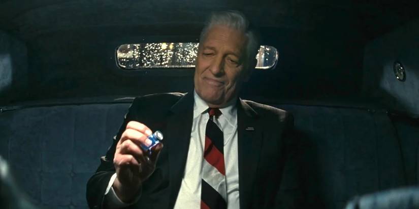 The President in the back of a car looking at the cold fusion in Fallout.