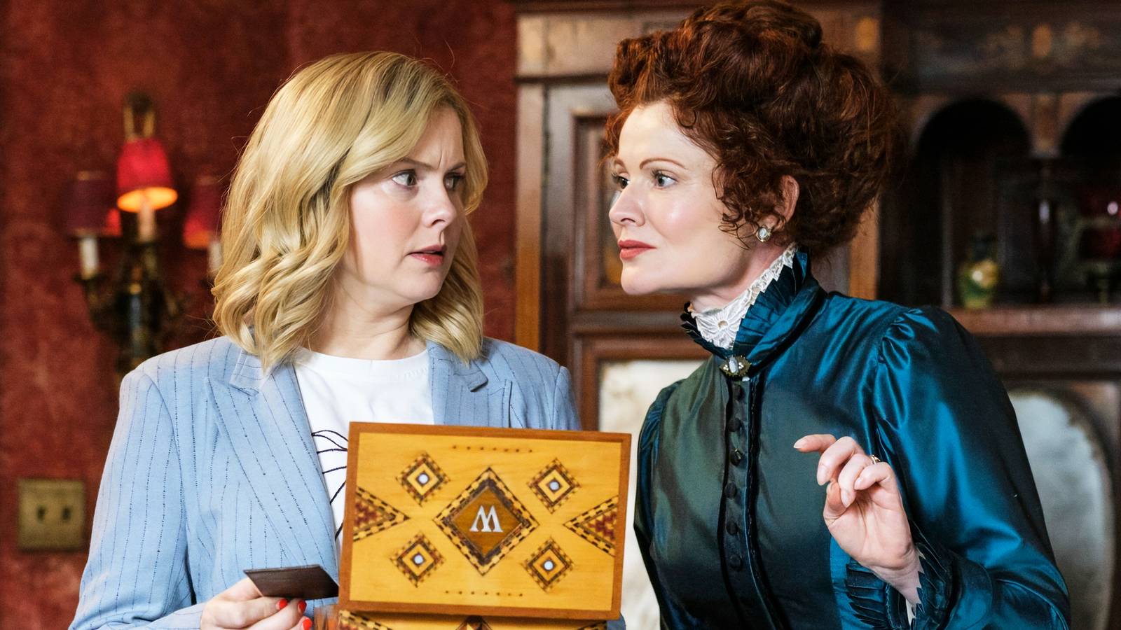 Rose McIver and Rebecca Wisocky in Ghosts Season 5 Episode 12