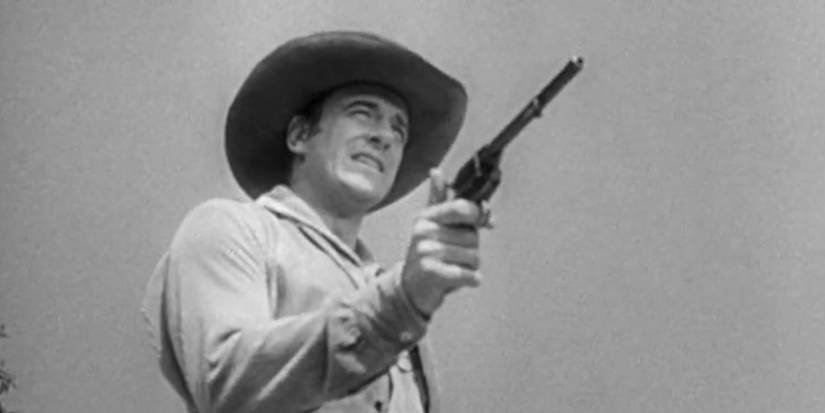 Marshal Matt Dillon (James Arness) pulls a gun in the 'Gunsmoke' intro