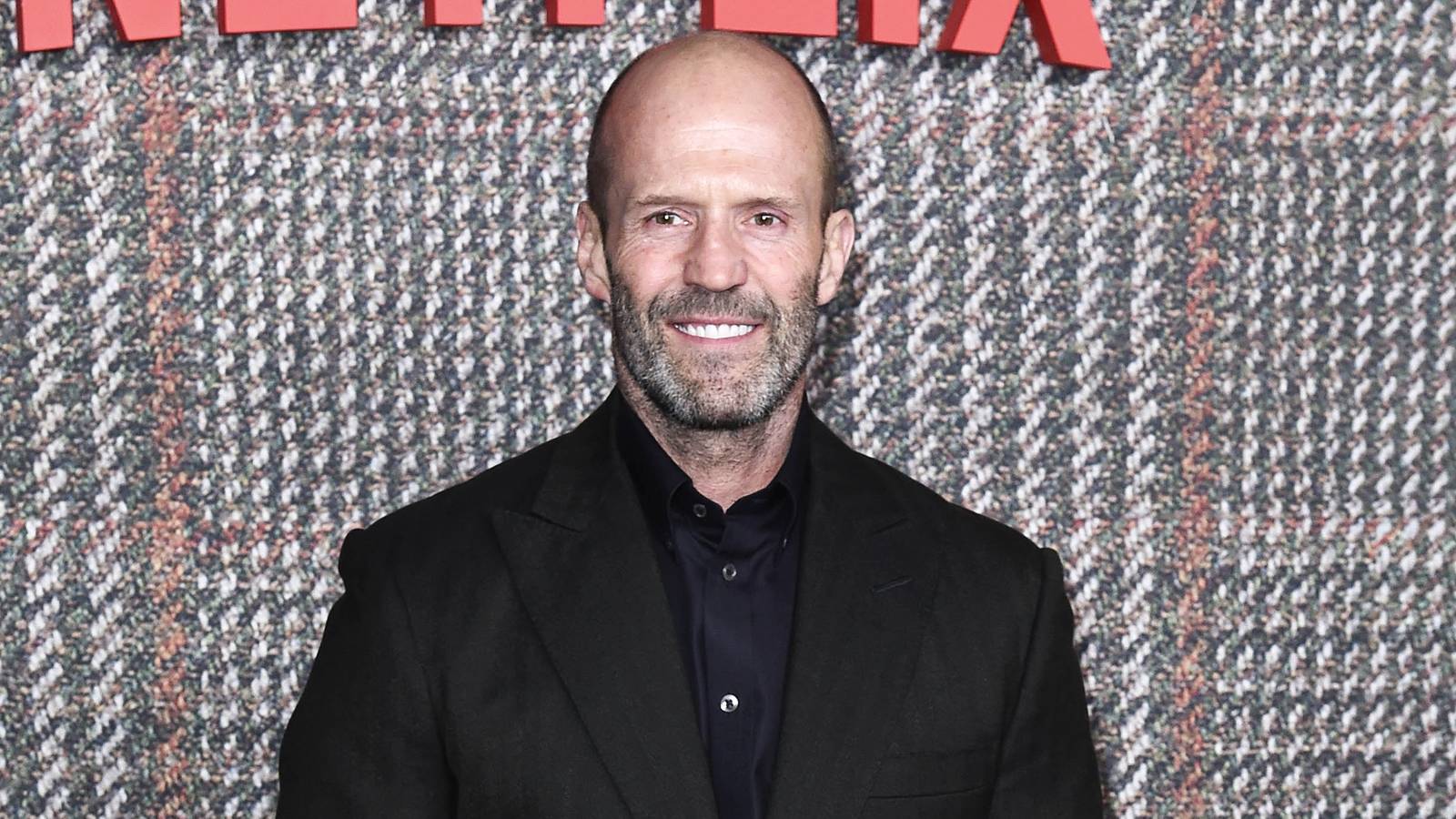 Statham Unleashed: Action Icon Plays Himself in Meta Comedy from 'Bullet Train' Director!