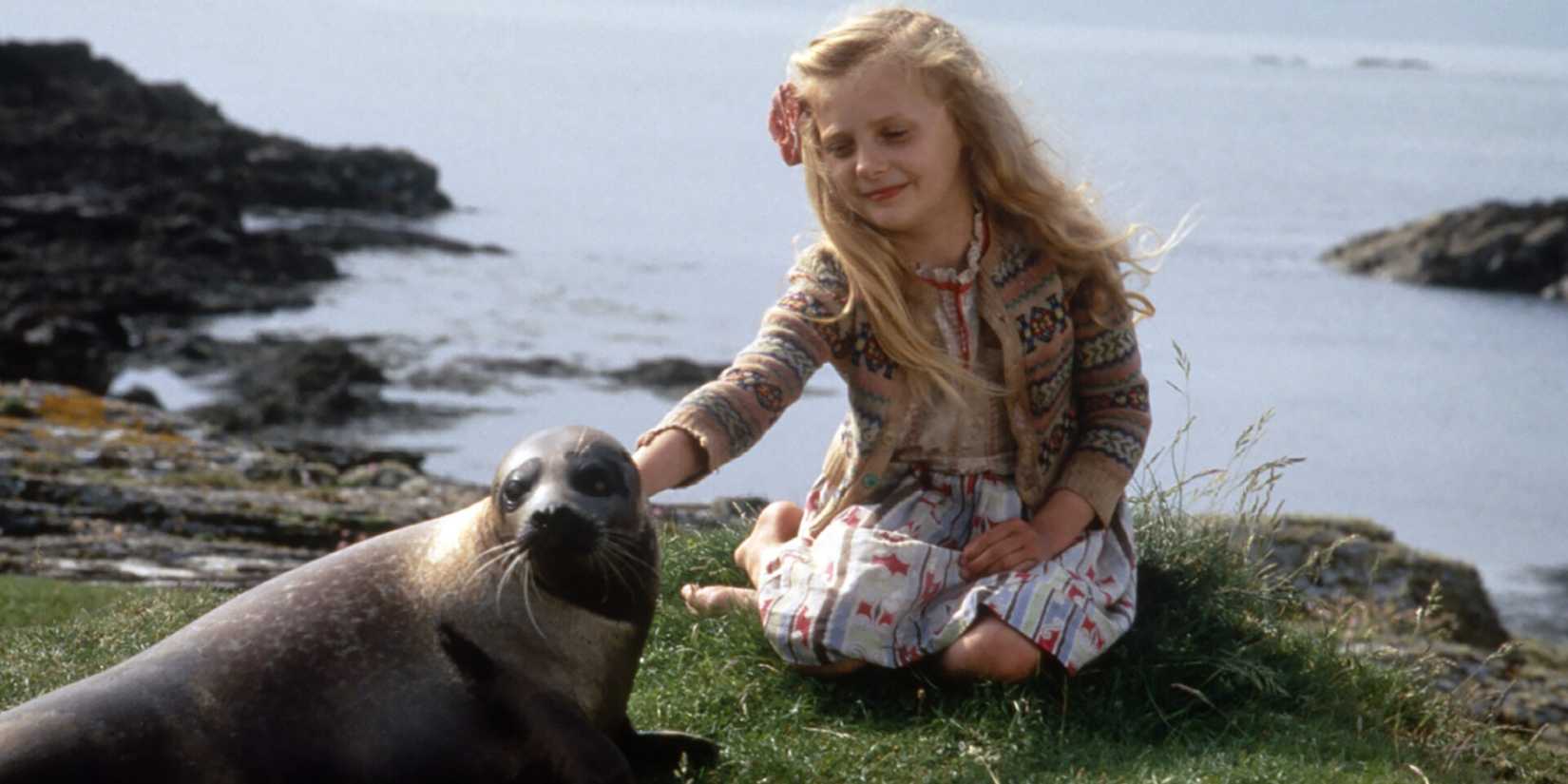Jeni Courtney with a seal in 'The Secret of Roan Inish'