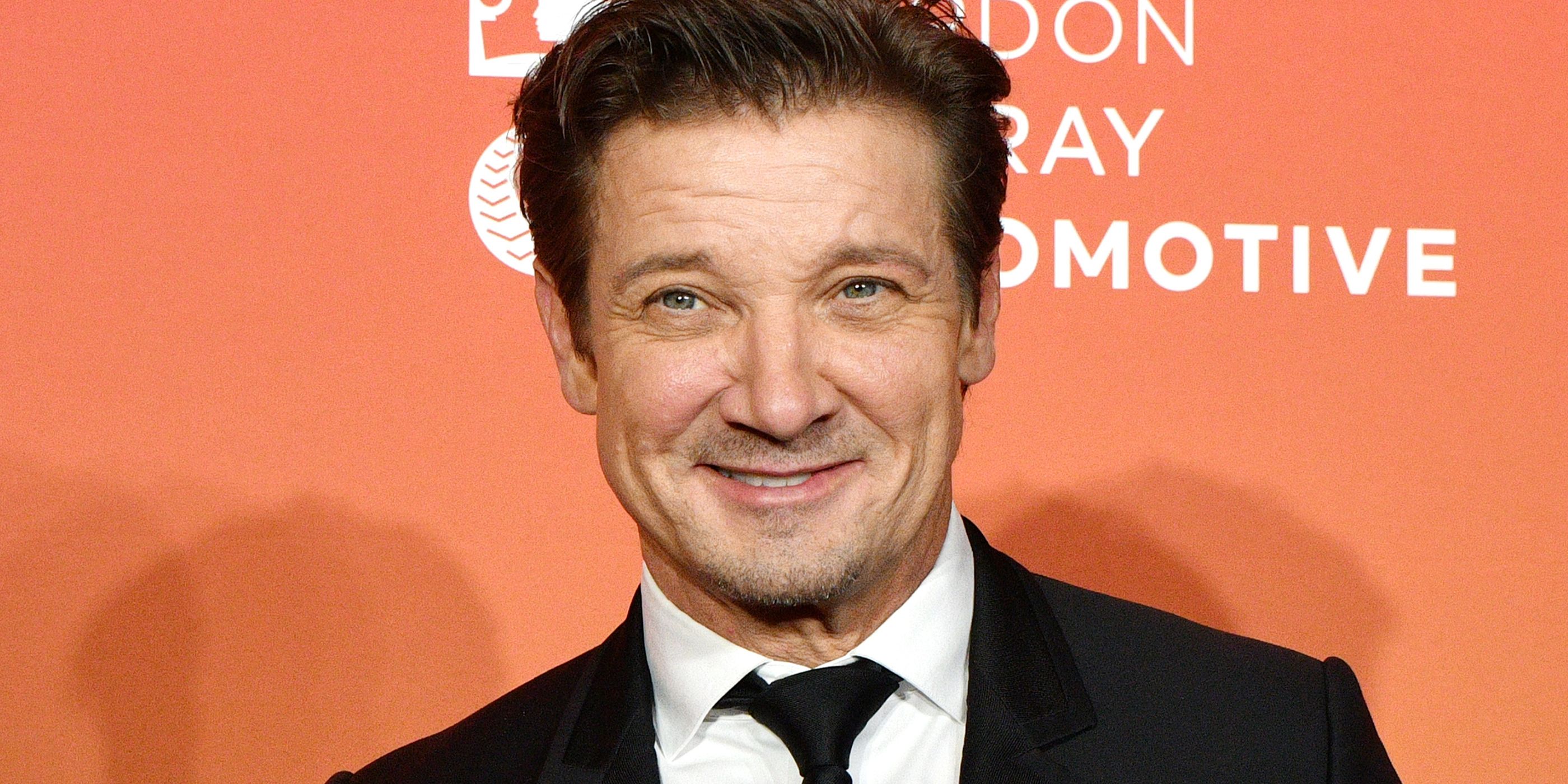 Jeremy Renner smiling on the red carpet