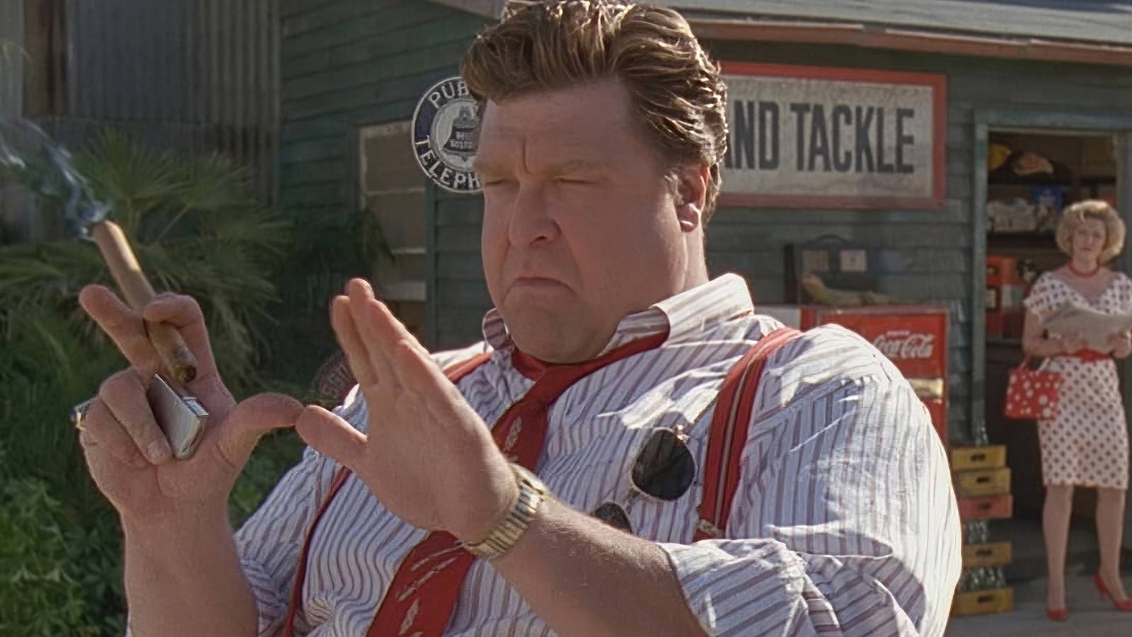 John Goodman doing the framing sign with his hands while smoking a cigar in Matinee