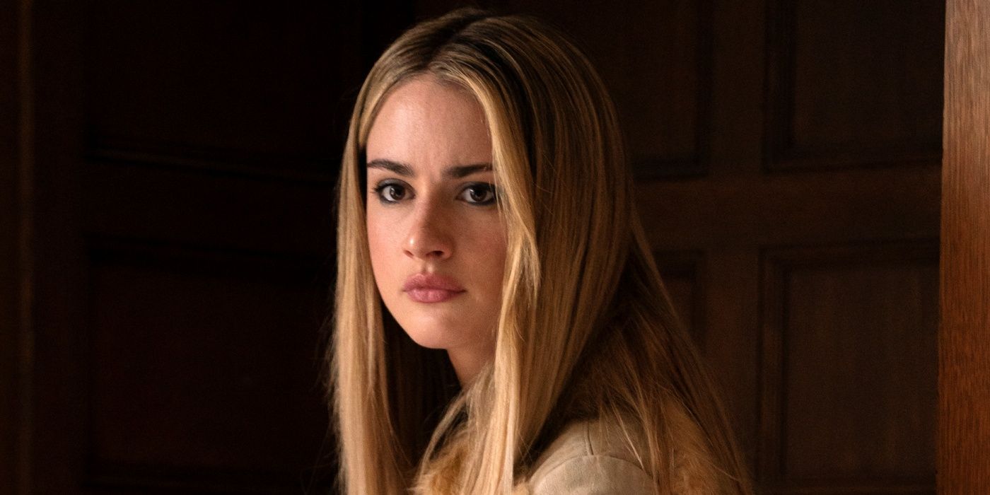 Grace Van Patten as Lucy looking serious at someone off-camera in Tell Me Lies Season 3