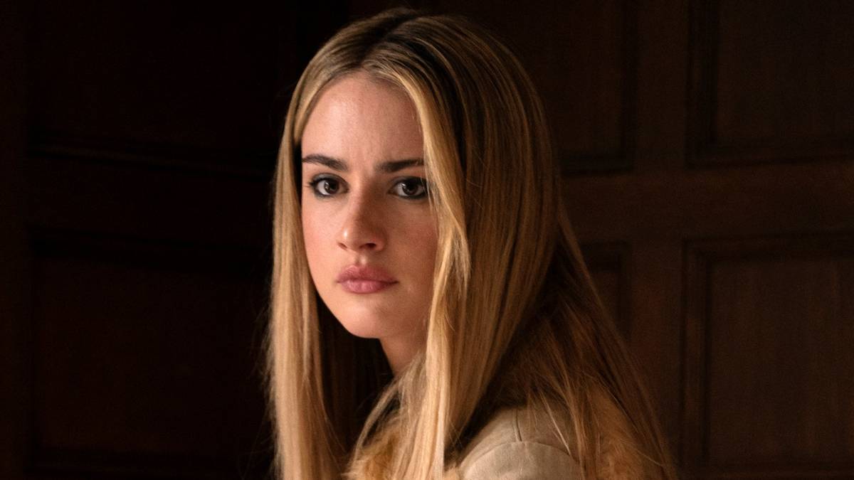 Grace Van Patten as Lucy looking serious at someone off-camera in Tell Me Lies Season 3