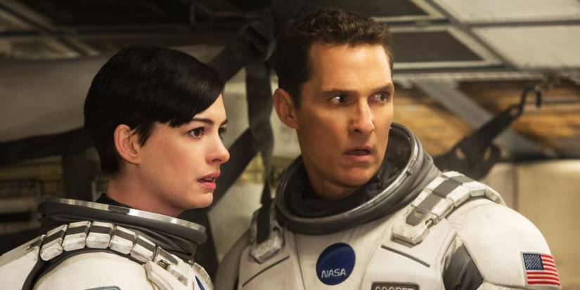 Anne Hathaway and Matthew McConaughey without their helmets in a spacecraft in Interstellar