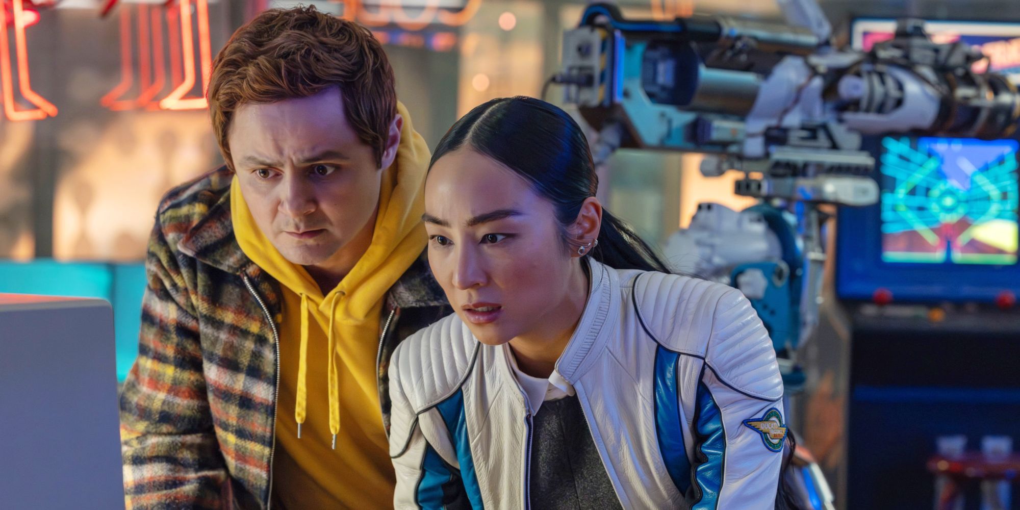 Arturo Castro and Greta Lee in 'Tron: Ares'