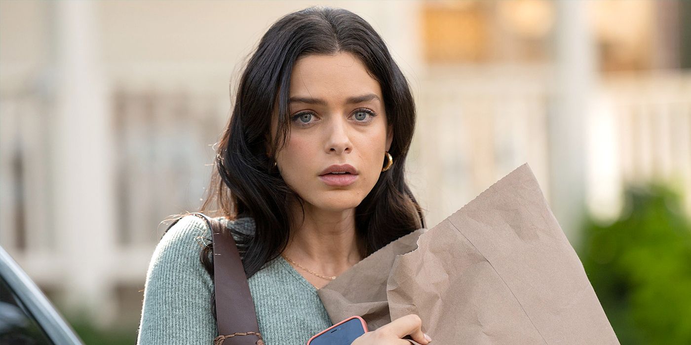 Surprised woman holding a paper bag
