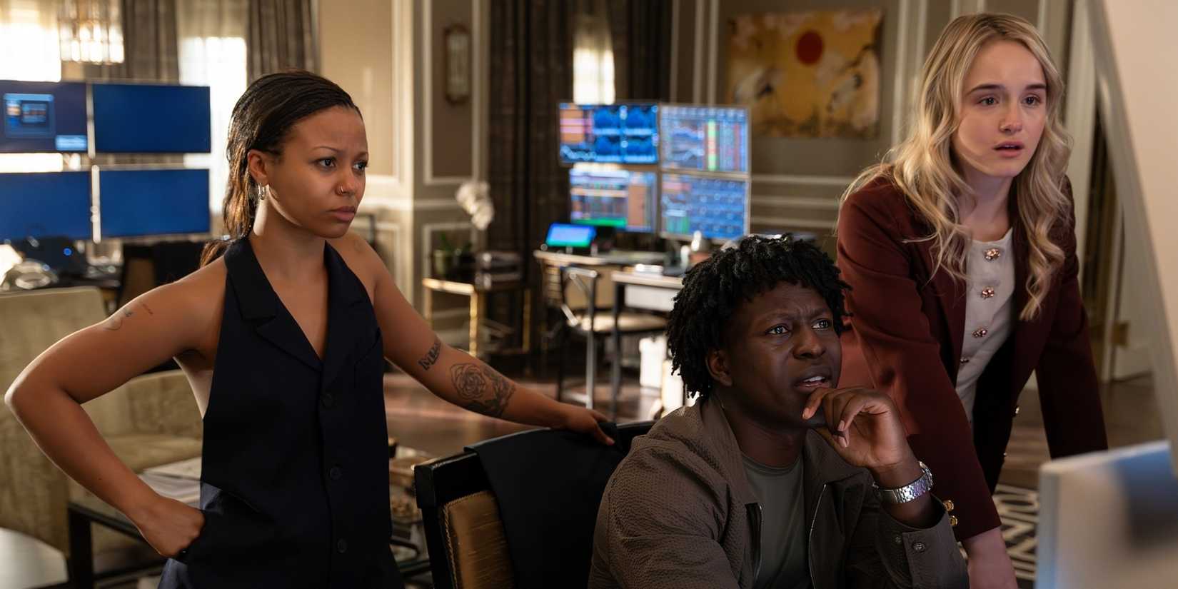 Myaha'la as Harper standing with Toheeb Jimoh as Kwabena and Miriam Petche as Sweetpea in Industry Season 4