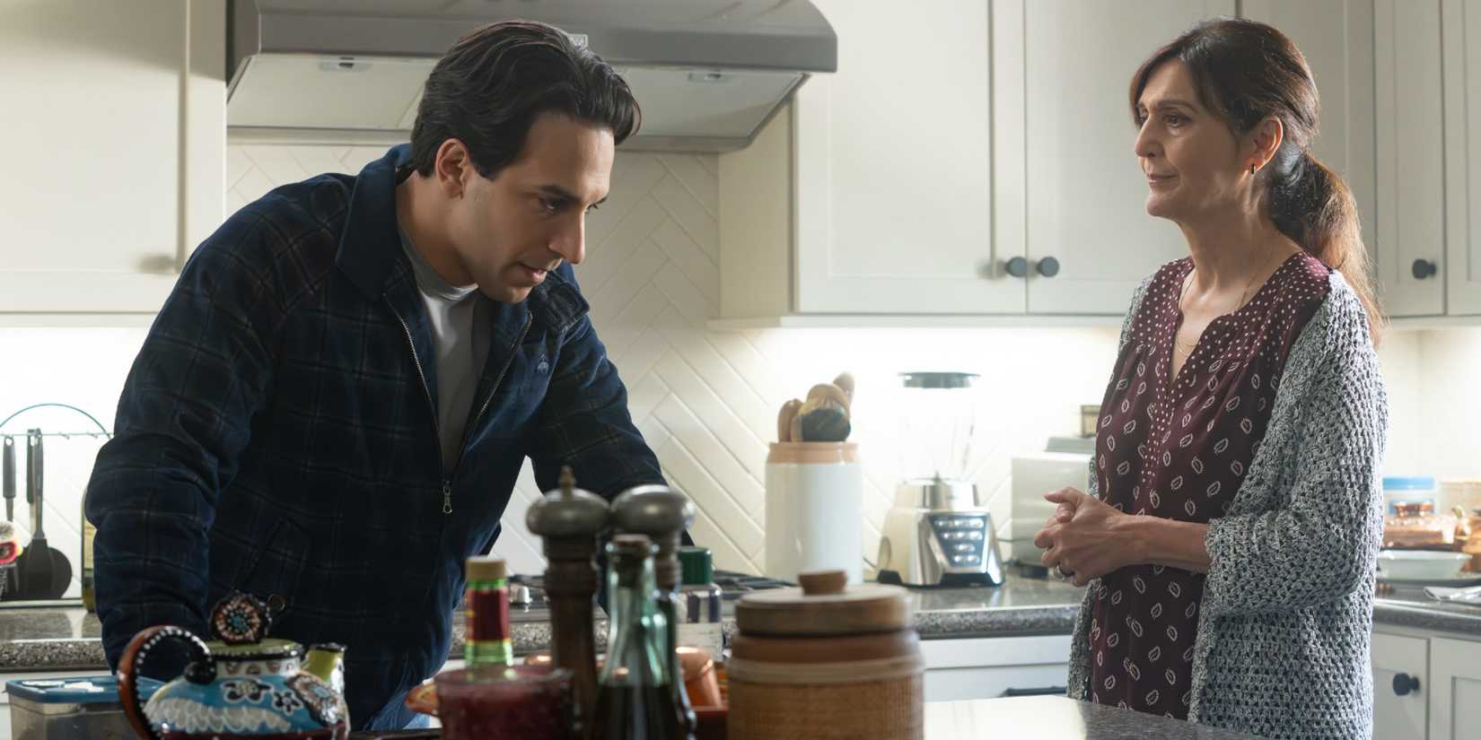 Lev "Oz" Ozdil and his mother standing in the kitchen in High Potential Season 2 Episode 12