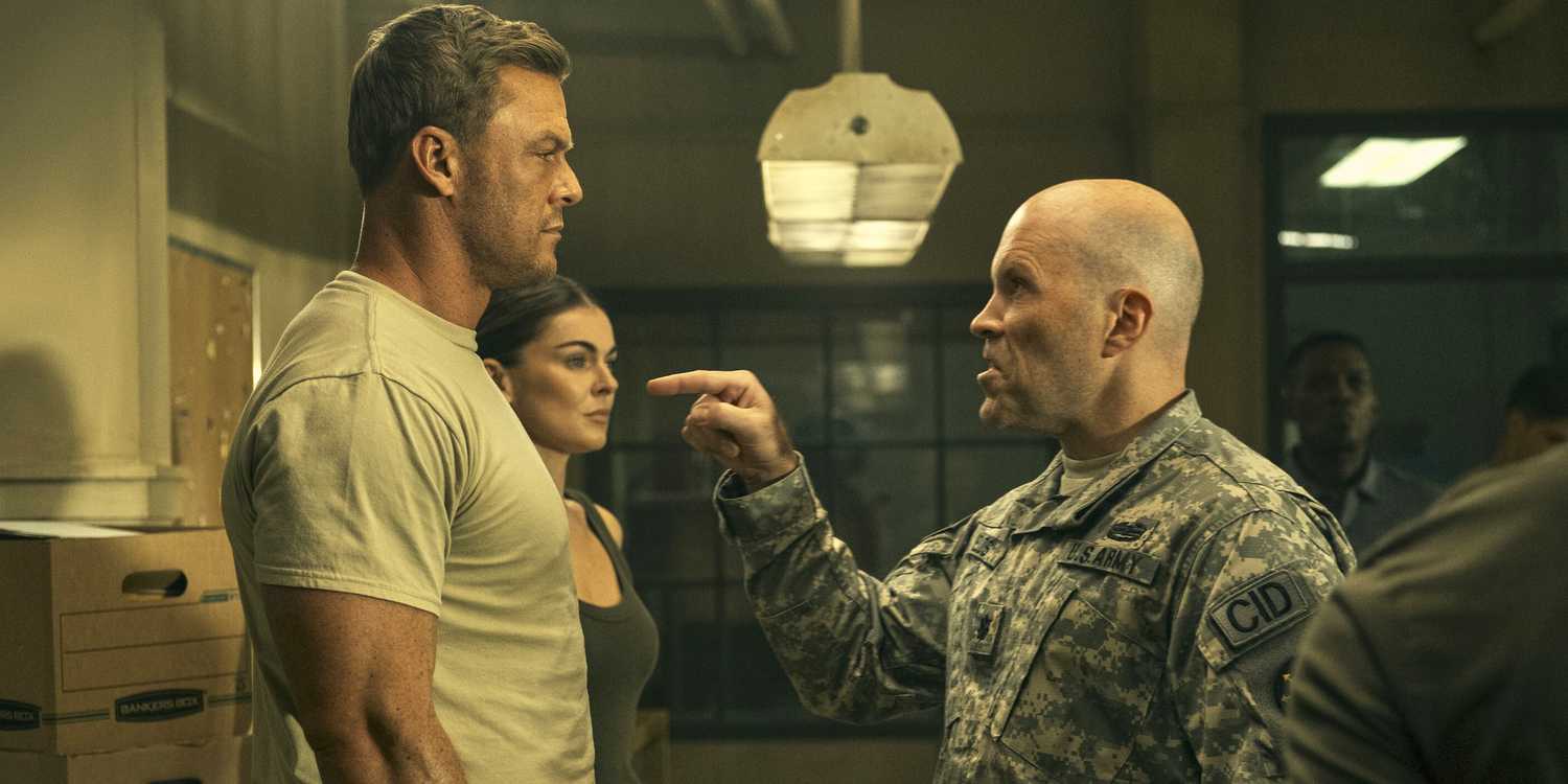 Man in uniform pointing angrily at Reacher