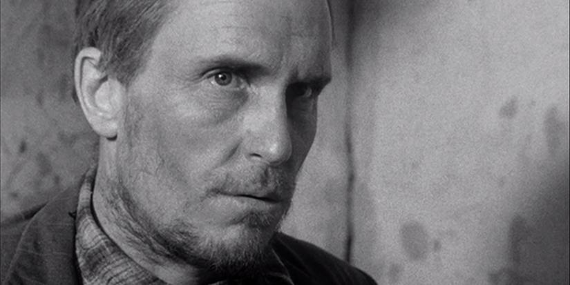 Robert Duvall looking stern in black and white in 'Tomorrow' (1972)