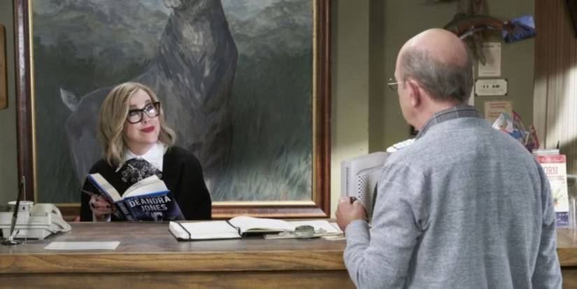 Catherine O'Hara as Moira Rose at the front desk during the 'Schitt's Creek' episode 'Motel Review.'