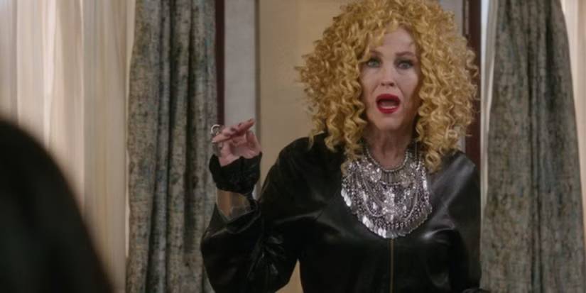 Catherine O'Hara as Moira Rose in a curly wig looking shocked in the 'Schitt's Creek' episode 'RIP Moira Rose.'