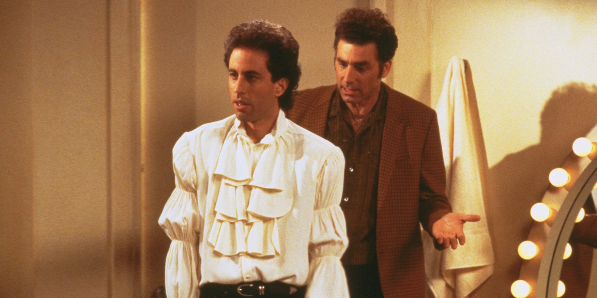 Jerry wearing the puffy shirt with Kramer behind him on Seinfeld.