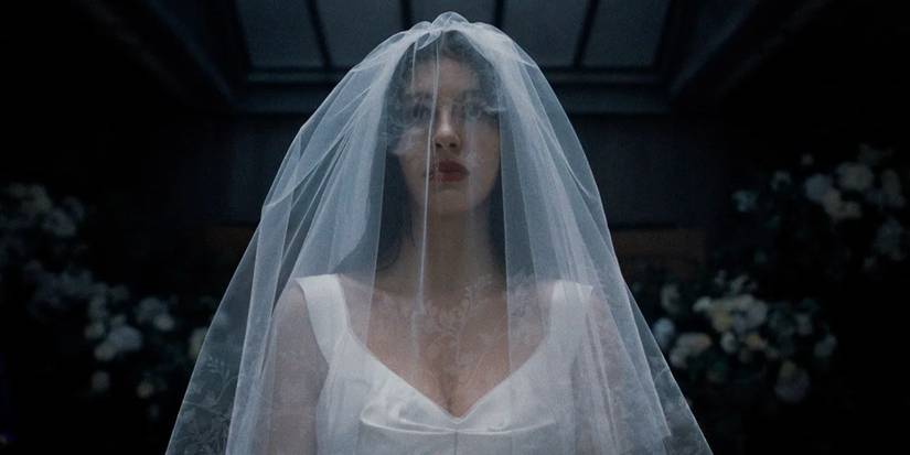 Camila Morrone in a wedding dress in the Netflix miniseries 'Something Very Bad Is Going to Happen'