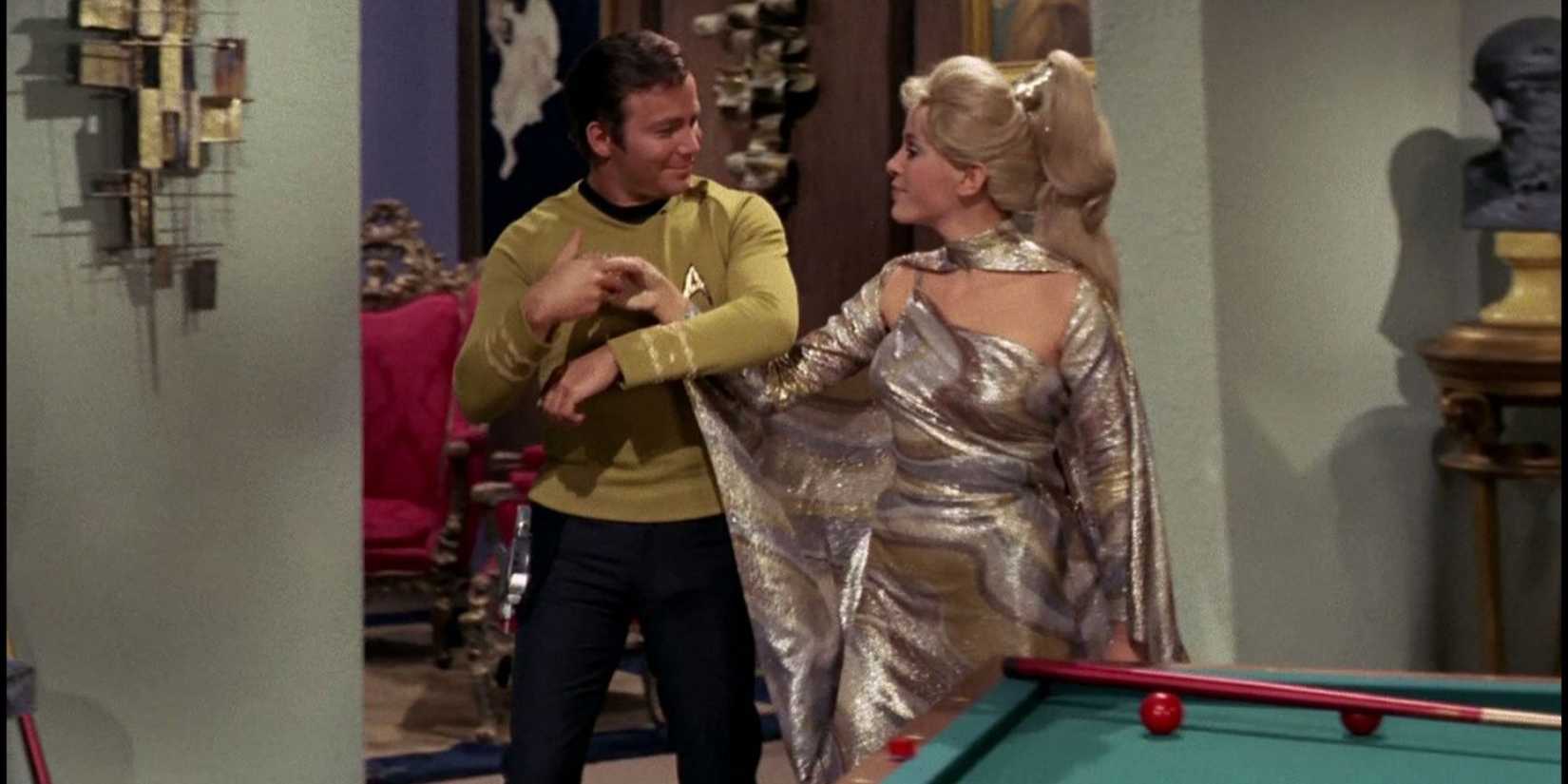 Kirk takes Rayna's hand