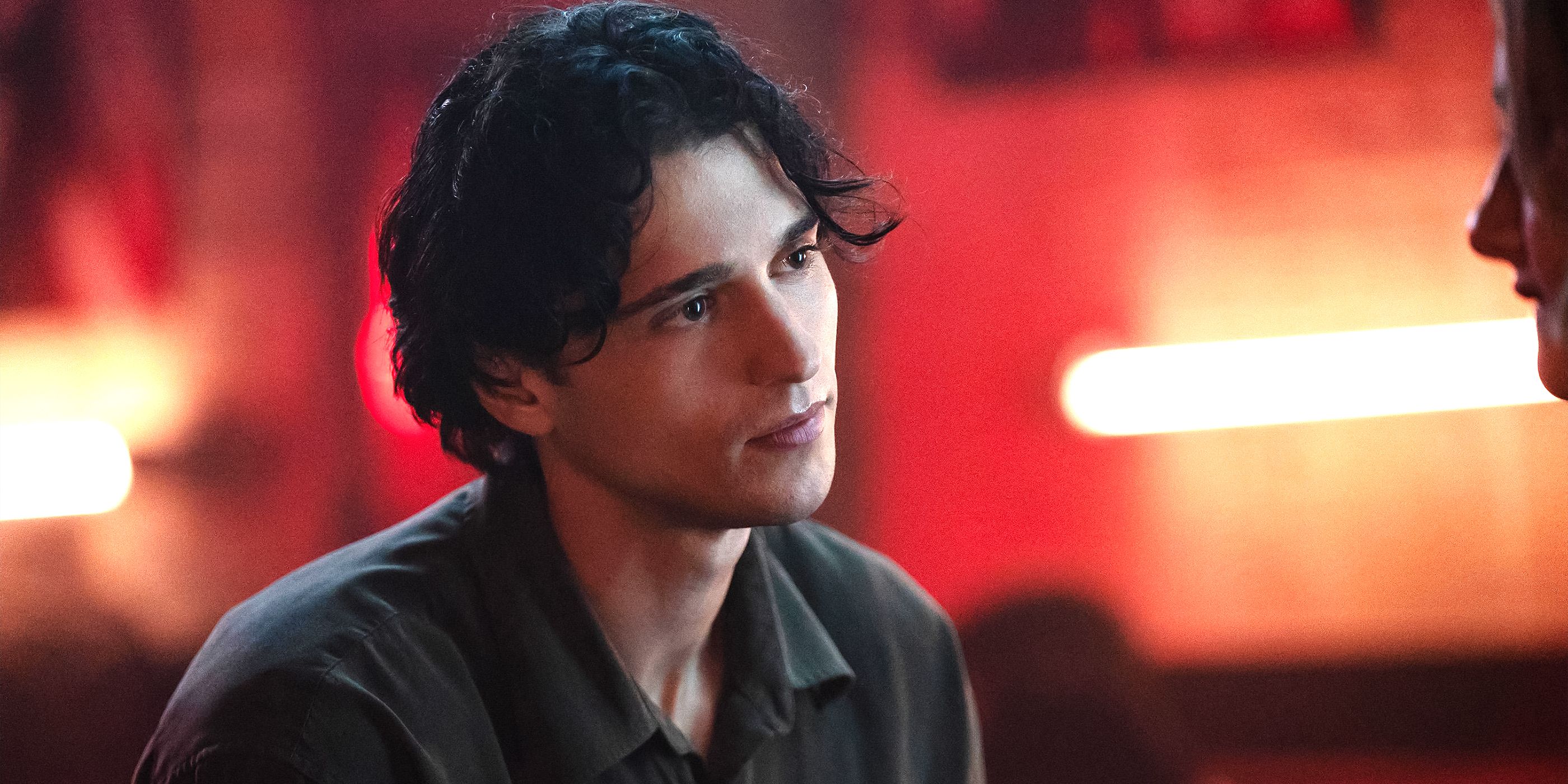 Costa D'Angelo wears a gray shirt and looks off screen in Tell Me Lies