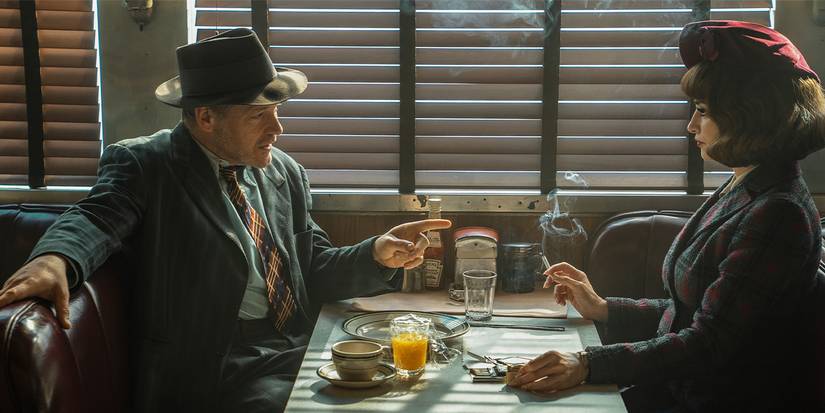 Jake Wiles talking with Myrna Mallow over breakfast at a diner.