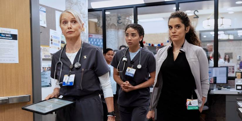 Emma Nolan and Dr. Baran Al-Hashimi walking closely behind Dana Evans in The Pitt Season 2 Episode 7