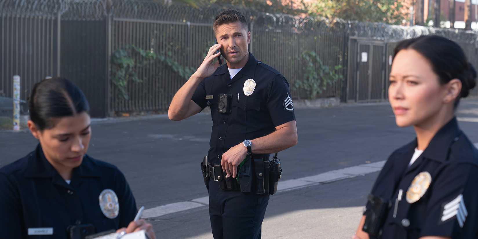 Eric Winter as Tim Bradford on the phone behind Melissa O'Neil as Lucy Chen and Lisseth Chavez as Celina Juarez in The Rookie