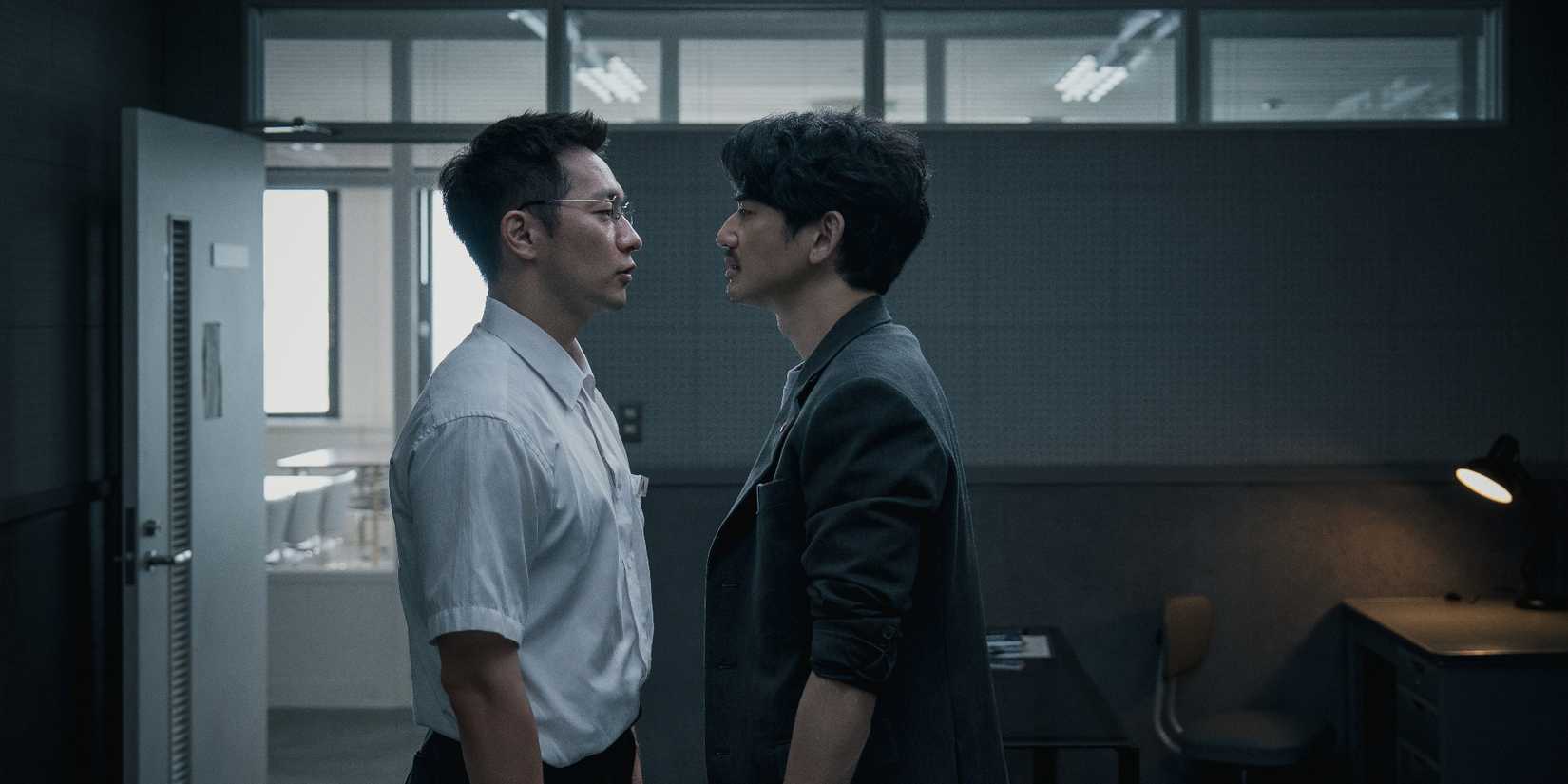 Son Suk-ku and Eita Nagayama standing very close to each other and staring at each other in Road (WT)