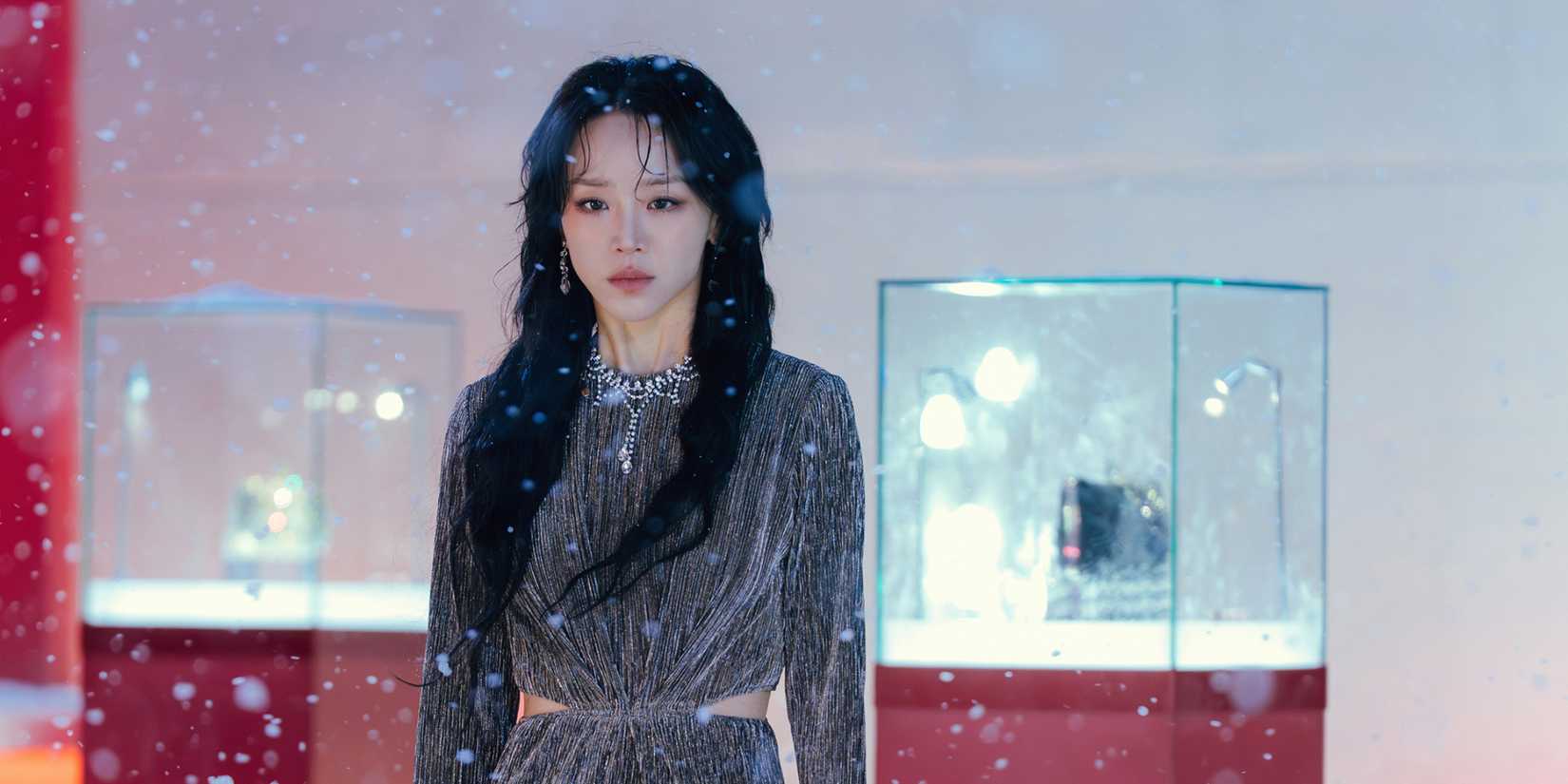 Shin Hye-sun in The Art of Sarah, standing in a red and white room 