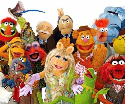 Miss Piggy, Kermit, Gonzo, Fozzie, and more in a Muppets group shot.