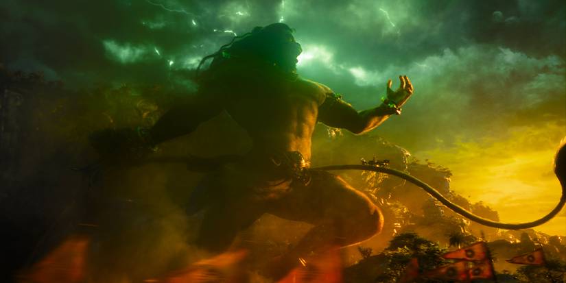 A giant creature bounds forward with a fleet of humans moving across its tail.