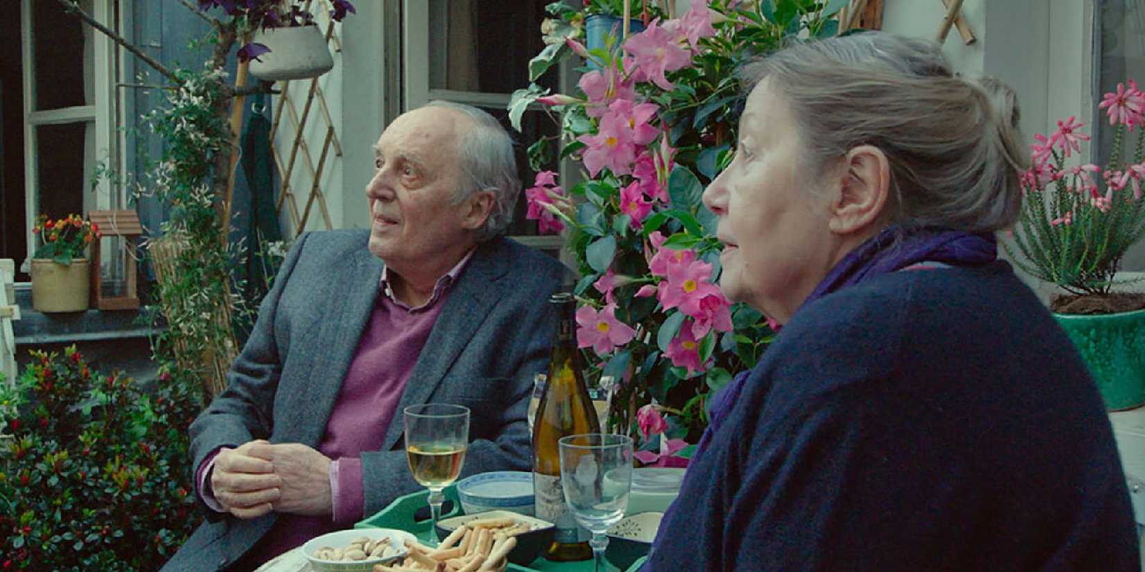 Françoise Lebrun and Dario Argento sit at the table together in Vortex.
