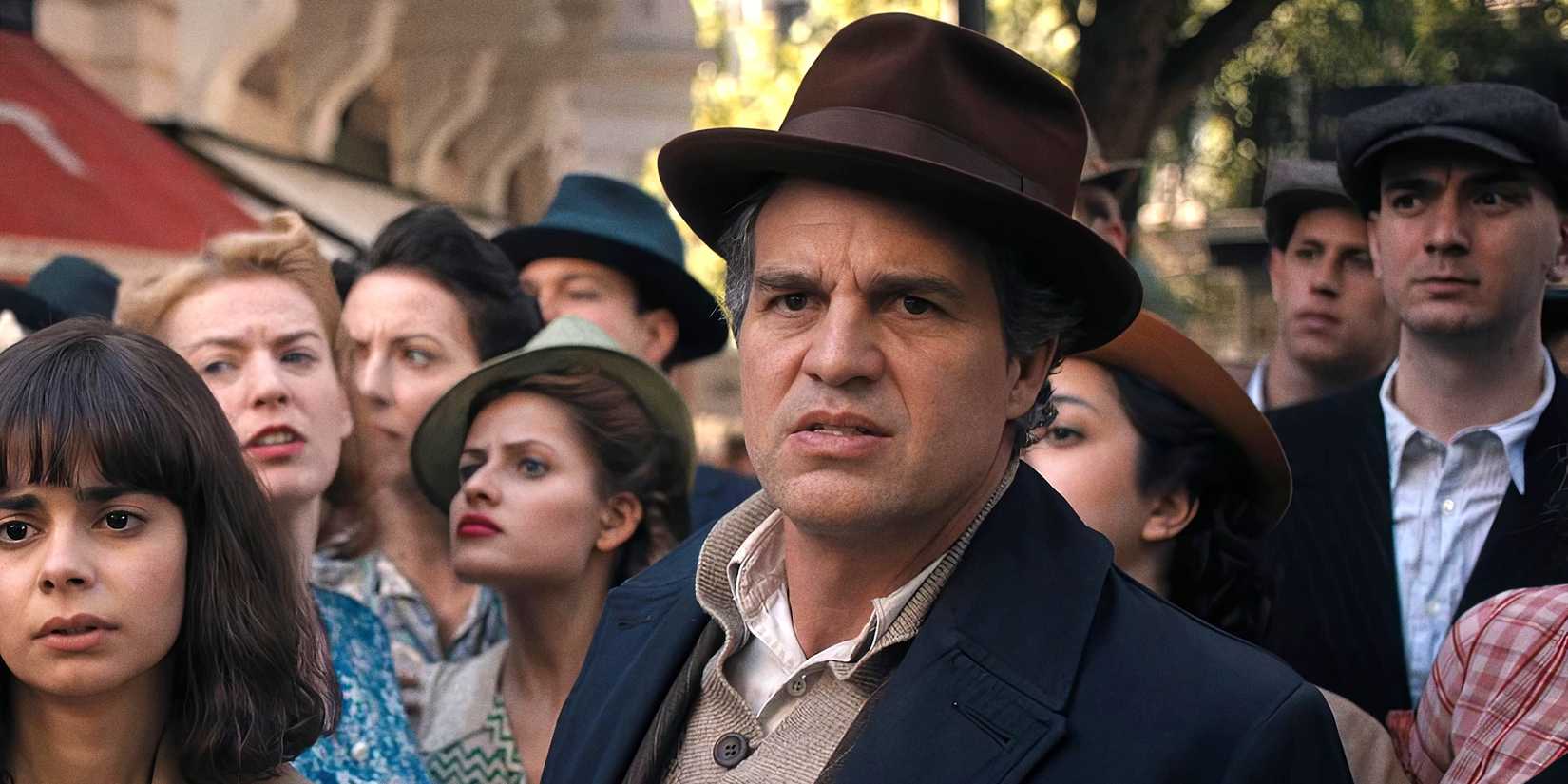 Mark Ruffalo staring ahead in a crowd in All the Light We Cannot See 