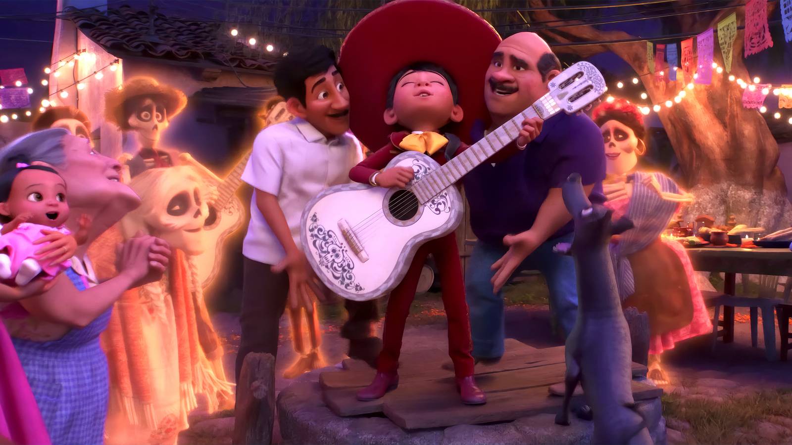 Miguel dressed as a mariachi singing for his family in the ending of Coco
