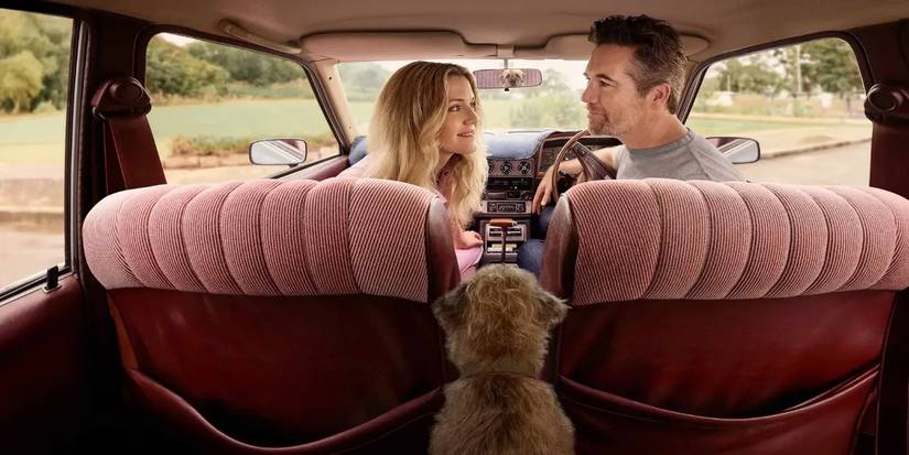 Ashley (Harriet Dyer) and Gordon (Patrick Brammall) sitting in a car, smiling at each other.