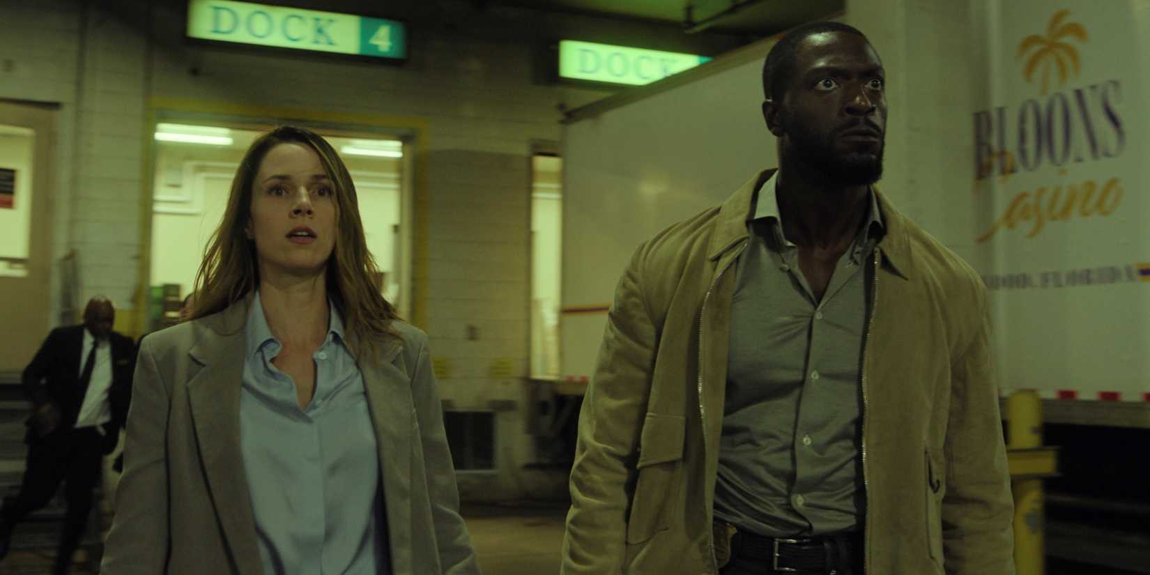 Alona Tal as Kayla Craig with Aldis Hodge as Alex Cross walking side by side in Cross Season 2