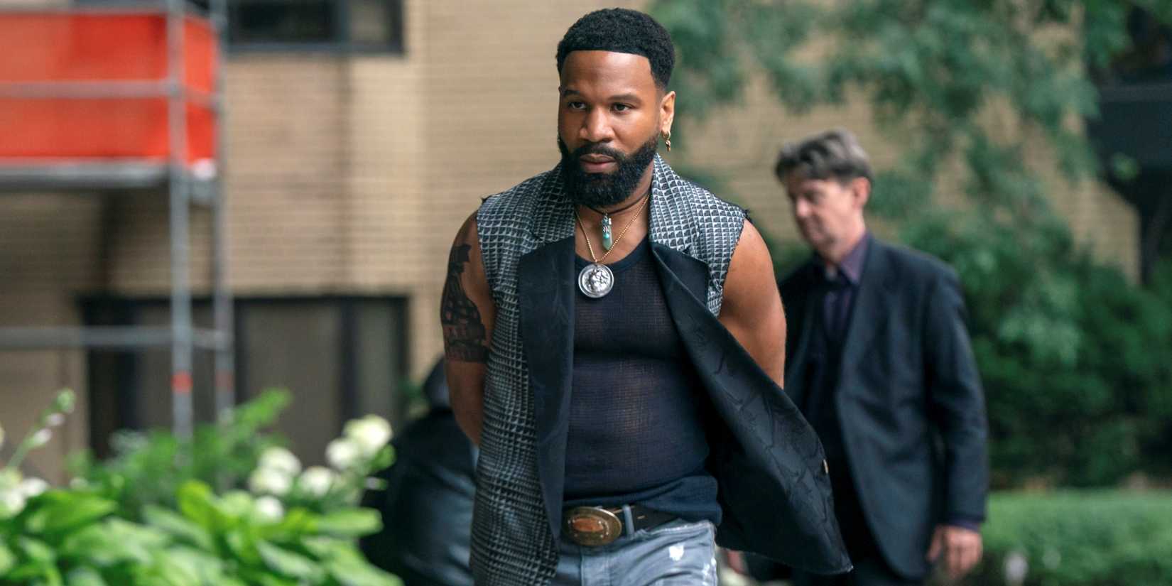 Johnny Ray Gill as Bobby Trey walking outside at a fast pace in Cross Season 2