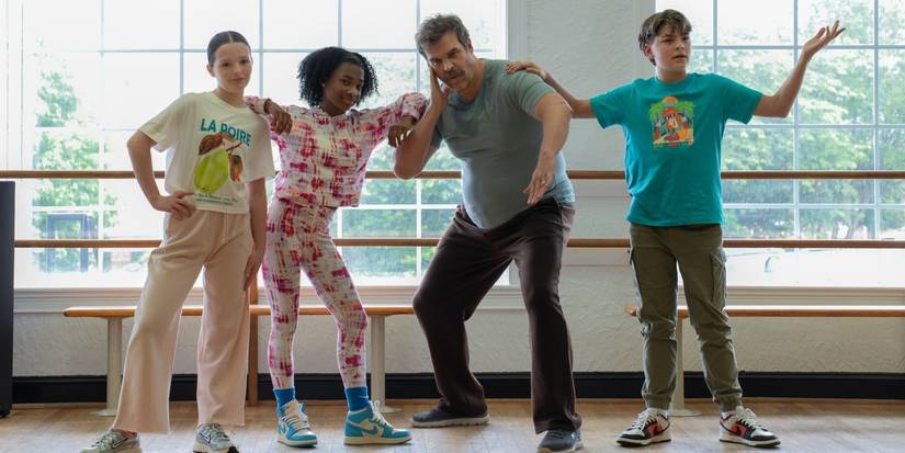 David Harbour as Floyd posing in a hip-hop dance class with three kids in DTF St. Louis