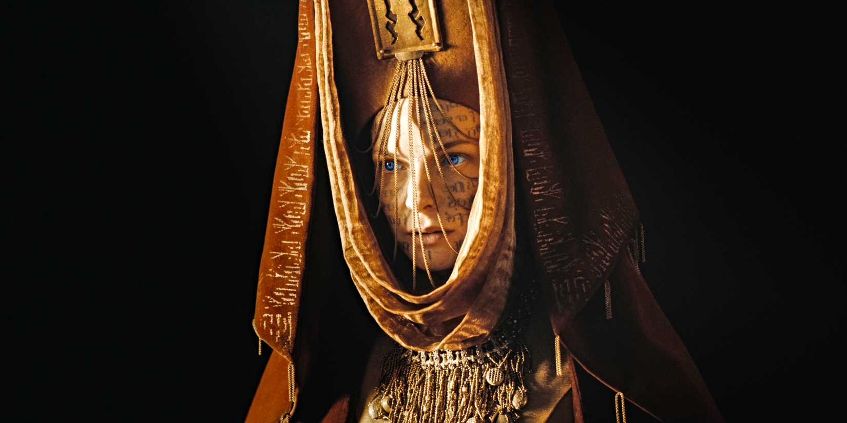 Rebecca Ferguson wearing fancy headdress and face markings in Dune Part Two