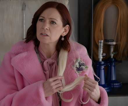 Elsbeth (Carrie Preston) holding hair in Elsbeth Season 3 episode