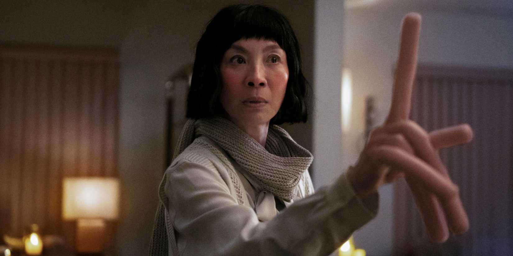 Michelle Yeoh with hot dog fingers in Everything Everywhere All at Once