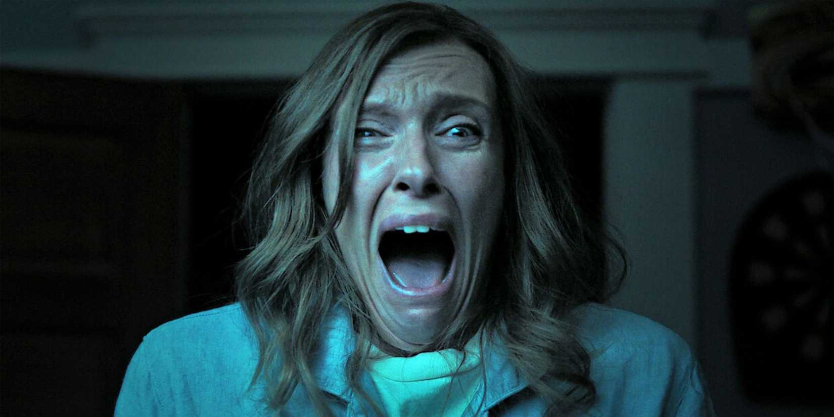 Toni Collette as Annie Graham screaming in fear at something unseen in Hereditary (2018)